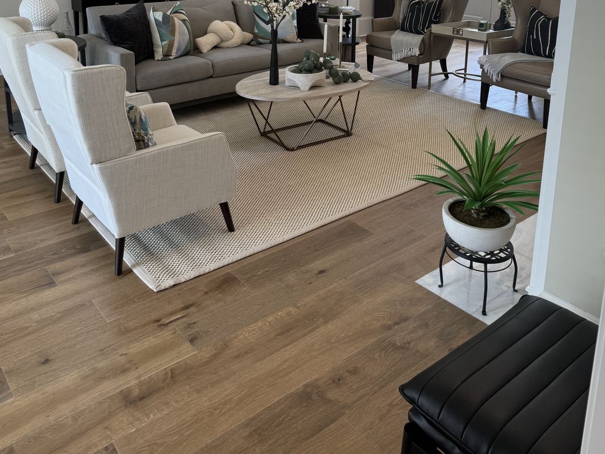 Living room with wide-plank natural oak floors