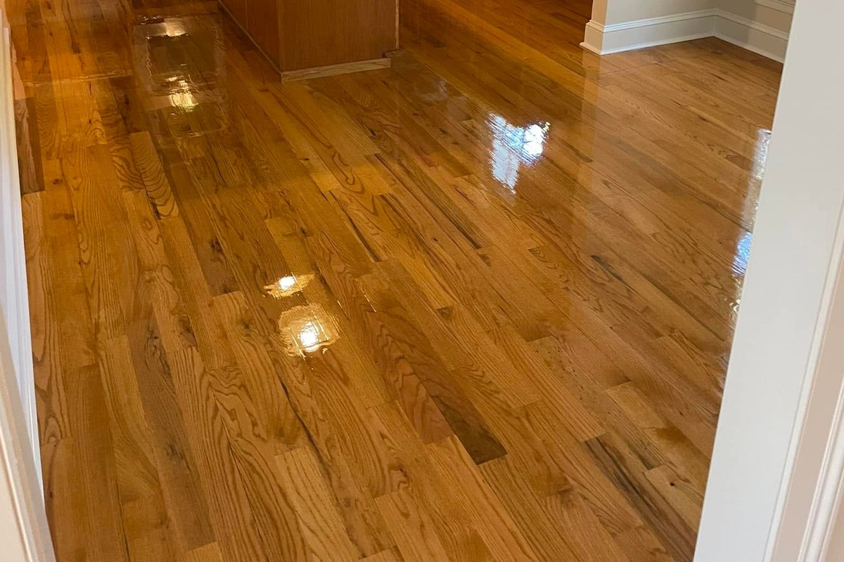 Kitchen with a refinished red oak floor in a high-gloss finish