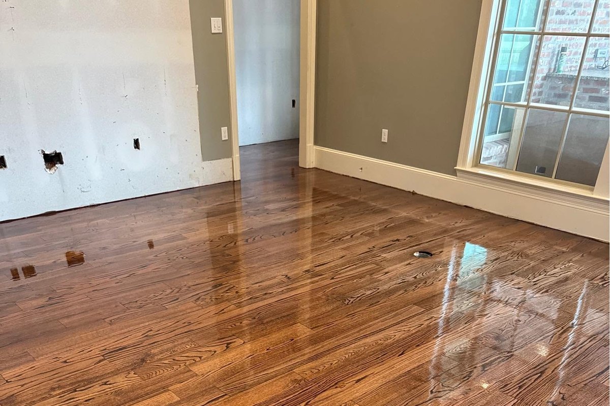 A refinished red oak floor stained warm medium brown