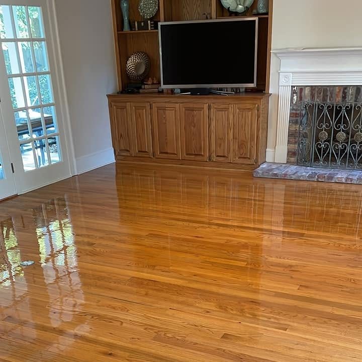 Living room with a high-gloss refinished red oak floor