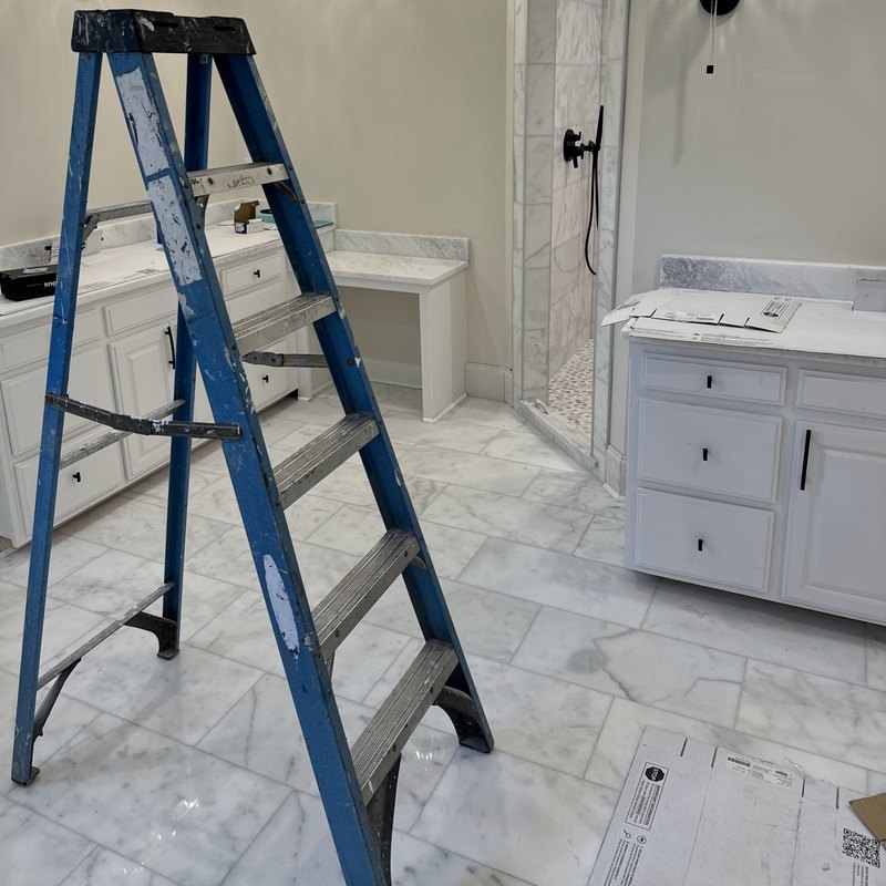 Primary bathroom near completion with a diagonal tile floor