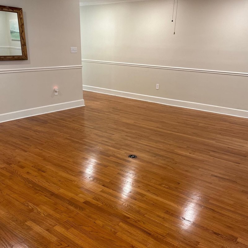 Honey red oak floor in a satin sheen under beige walls